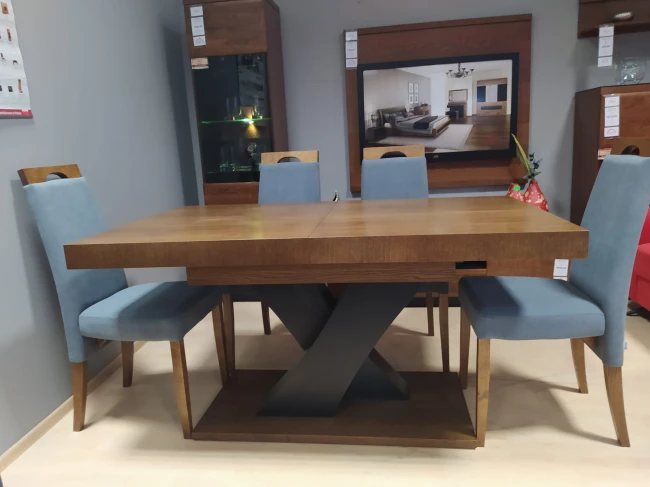 Stół fornirowany dębowy Valentino X na kolumnie firmy Bukowski Meble + krzesła Negro